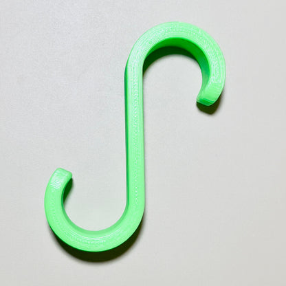 Towel hanger for bathroom radiator